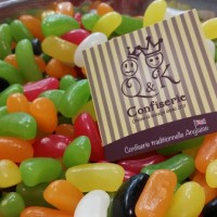 Logo de QK confiserie dans les bonbons